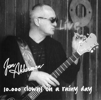 Jan Akkerman 10,000 Clowns On A Rainy Day - LIVE album cover